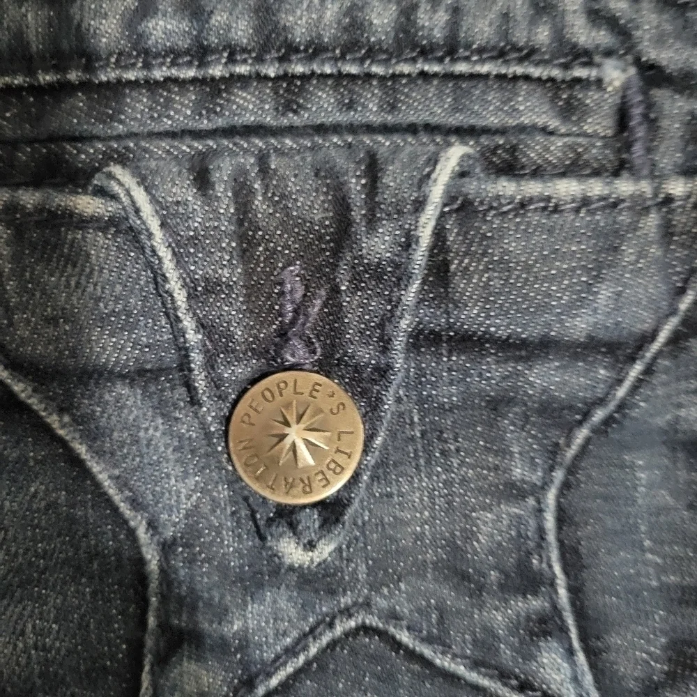 People's Liberation distressed skinny jeans size 25 with star pockets